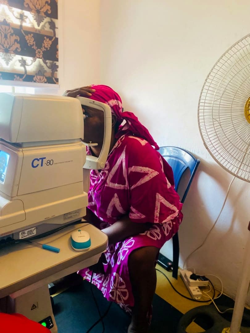 A patient's eye pressure being measured on the CT.80 tonometer at God First